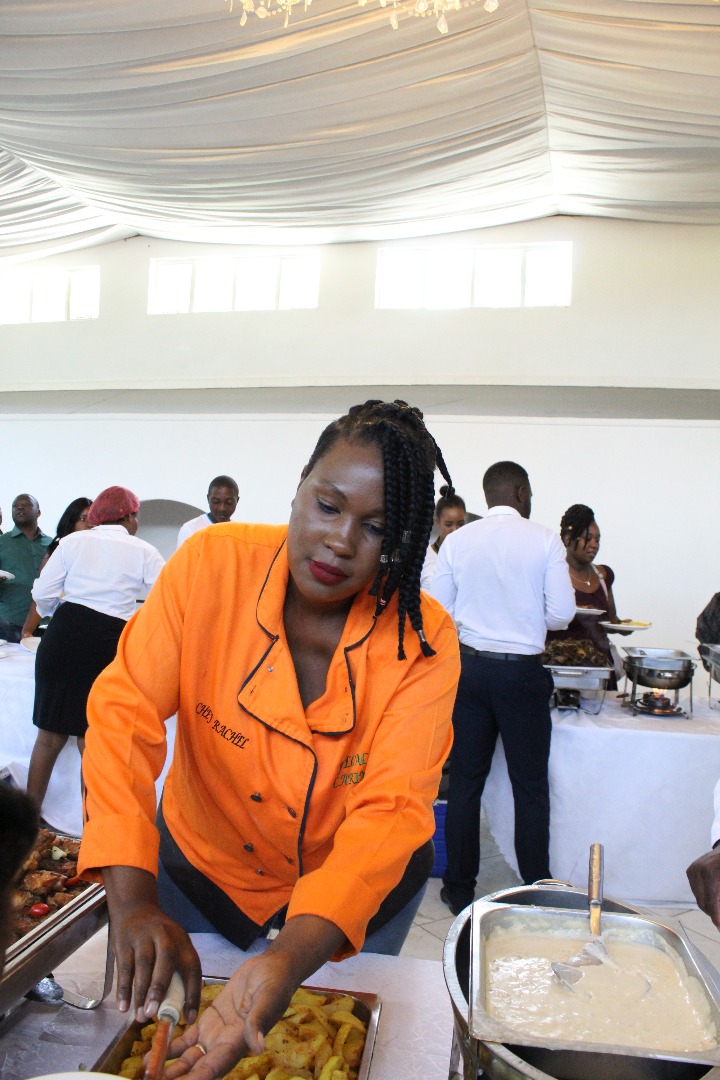 some food being held by a chef